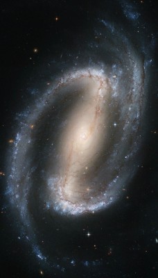 thetimeandspaceblog:  Big, beautiful, barred spiral galaxy NGC