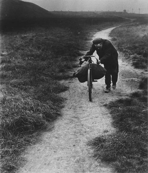 Bill Brandt - Unemployed miner returning home from Jarrow, 1937.