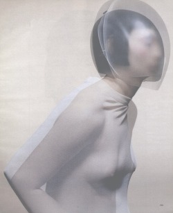 qock:  Cocoon dress by Hussein Chalayan and glass headpiece by