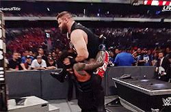 oflanternhill: Roman Reigns powerbombs Kevin Owens through the