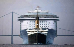 sixpenceee:  Titanic to scale in front of a modern passenger