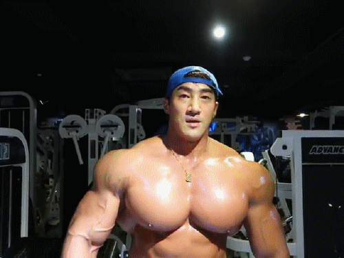 muscleobsessive:Chul Soon, popping out those sweaty monster pecs,