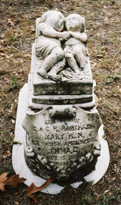 Gravestone of sisters, Mary and Emma Hartman, ages 9 and barely