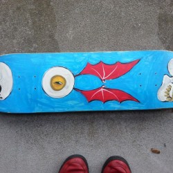 Bottom of the skulls and winged eyeball deck. 8.5" wide