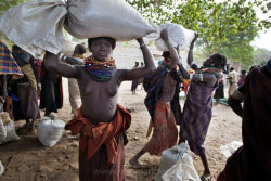  Ethiopia’s Omo Valley, by Olson and Farlow    Food aid hand