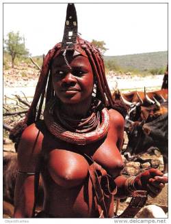   Namibian Himba woman. Via Delcampe.   