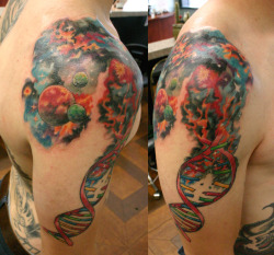 fuckyeahtattoos:  A DNA strand breaking into a universe - I love