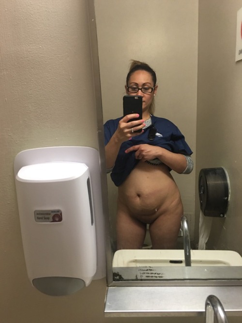 sexonshift:  My naughty NYC nurse wife back at it again love it when i get pics of her like this i don’t mind when she shares her pics with other she is a big tease but believe it or not she doesn’t feel she is sexy or beautiful she thinks she is