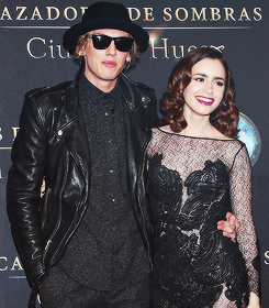 maliatale:  Lily Collins and Jamie Campbell Bower posing together