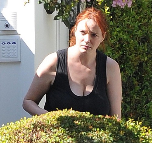 everydayvoyeur:Creeping on Christina Hendricks. Candids, downblouse, nipslips & more at http://everydayvoyeur.net 