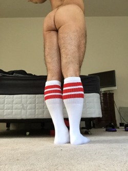 Men in rugby and footy socks