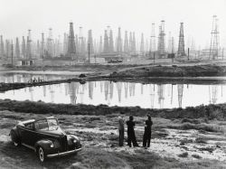 furtho:  B Anthony Stewart’s photograph of oil derricks at