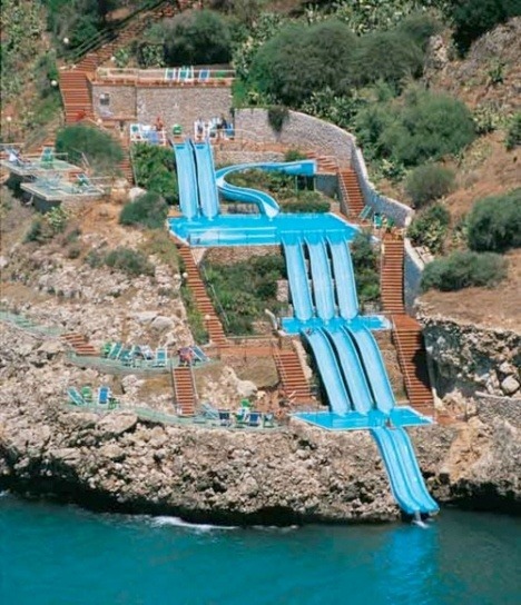 Beats taking the stairs (Cita del Mar Hotel in Sicily, Italy, has waterslides that whisk you right into the Mediterranean Sea)