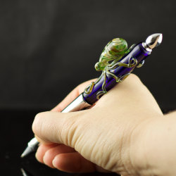 sosuperawesome:  Octopi pens, terrariums, glasses, straws - including