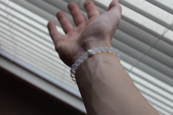 astralpossession:  Lokai Braclet. The white bead containts water