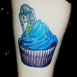 fuckyeahtattoos:  My little Zombie Cupcake! Done at Nemesis Tattoo &amp; Body Piercing in Camden, London. :3 