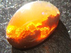 xysciences:  Mexian Fire Opal Stone. [Click for more interesting