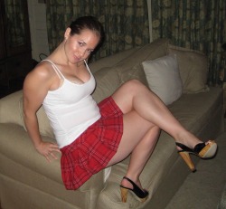 Horny slag from Liverpool in a tartan skirt and heels loves mature