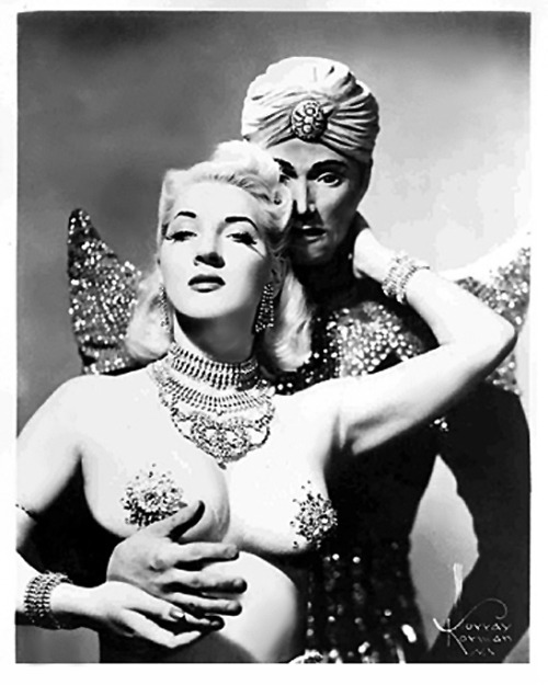  Gene Gemay    (and her Genie) She performed a popular routine themed around the “Arabian Nights” mythology.. Ms. Gemay would dance in a harem outfit & rub a large Aladdin’s Lamp onstage, from which a rubber mannequin “Genie”