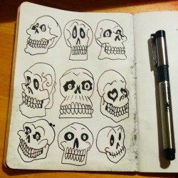 Filling up my Sketchbook Project aketchbook with skulls.  Technically