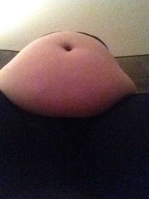 shinryuken3091: stuffedbellygirl18:  The most I can do without leaving the couch, my biggest shirts barely fit anymore!!  Gorgeous 