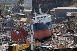 merosezah:   1. A cargo ship lies amidst the wreckage of Anibong