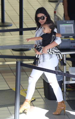 kimkanyekimye:  Kim & North at LAX airport in Los Angeles
