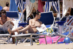 toplessbeachcelebs:  Asia Argento (Actress) sunbathing topless