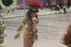 Topless at a Brazilian carnival, by Carlos Reis.