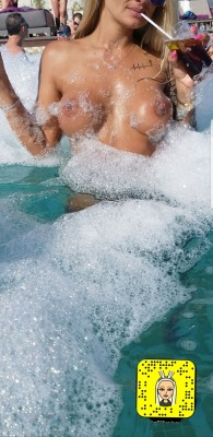 myfilthyvixen:  My Wife topless in the foam pool party in Cabo.