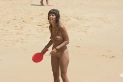 danielvincentstuff:  Nudist beauty playing at the beach 2 Love