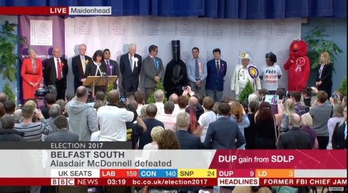 Theresa May (far left), at the announcement of the results in her local constituency of Maidenhead, along with her fellow candidates including Lord Buckethead, Elmo and Boss Hogg, apparently.