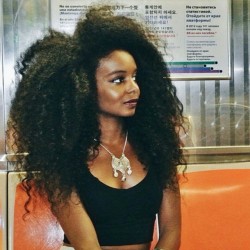 cocoamohaircare:  An effortless beauty on a NYC subway train.