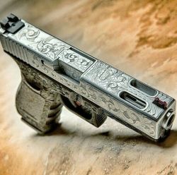 weaponslover:  Engraved Glock 20.