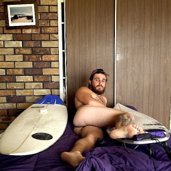 menandsports:  naked surfer on his bed : men and sports, gay