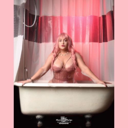 @therealmissred  showing a softer side #bubbles #cleavage #pink