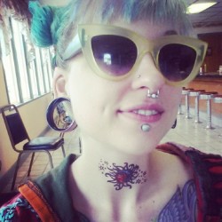 smurfasaur:  Yeah I got a sweet throat tattoo at the diner. No