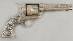  An incredible engraved Colt Single Action Army 