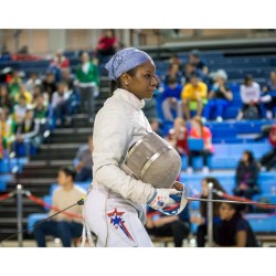 modernfencing:[ID: a fencer on strip, holding her mask and sabre.]lenajayusa:“Success