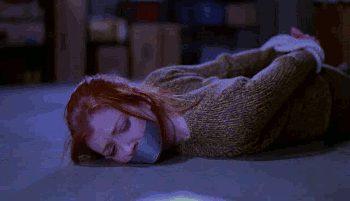 boundsilence:  Ah, “Normal Again.” This scene from Buffy The Vampire Slayer really needs no introduction. Alyson Hannigan and Michelle Trachtenberg bound hand and foot and gagged with tape speaks for itself. Apparently, Buffy is hallucinating or