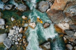 natgeotravel:  Kayaking on the Reuss river in Switzerland. See