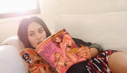 Megan Fox reading up on sissy training in the latest issue of