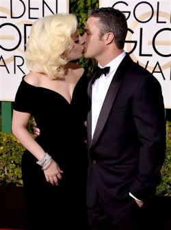 littlehookerofgaga:Lady Gaga & Taylor Kinney kissing at the