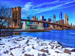 Blue skies & snowy shores by Brooklyn Bridge  				Inga’s