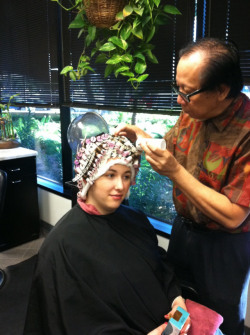 Look at this girl. She&rsquo;s sitting patient in the barberchair and she&rsquo;s getting her first perm. This will turn her into a young woman. Her hair looses virginity and she herself too soon. And for you sissy, you will get your first perm too.