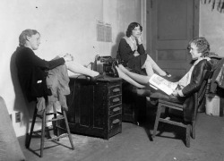 Three women at desk - Harry M. Rhoads  