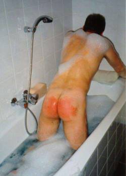 b-w-b-b:Being bathed by his father after his spanking. Afterwards