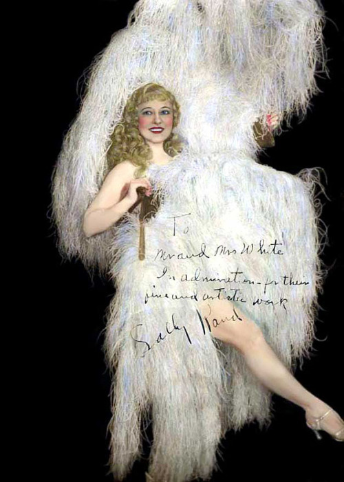    Sally Rand Vintage 30’s-era hand-tinted promo photo personalized: “To Mr. and Mrs. White — In admiration for their fine and artistic work  — Sally Rand ”..   