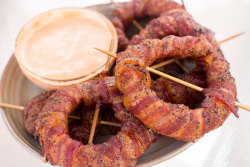 foodishouldnoteat:  Smoked Bacon Wrapped Onion Rings w/ Sriracha