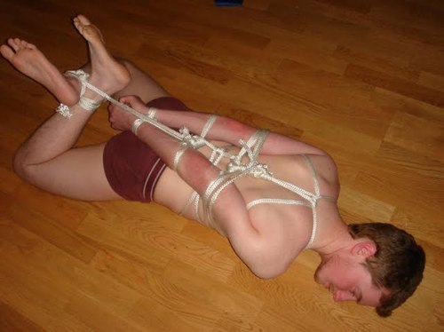 sockschastitychains:  informed-consent:  That is actually a pretty well tight hogtie, and those feet look sooooooo ready for some tickle torture!  Would love to be tied like this wearing a pair of crew socks on my feet and with some thick soccer socks